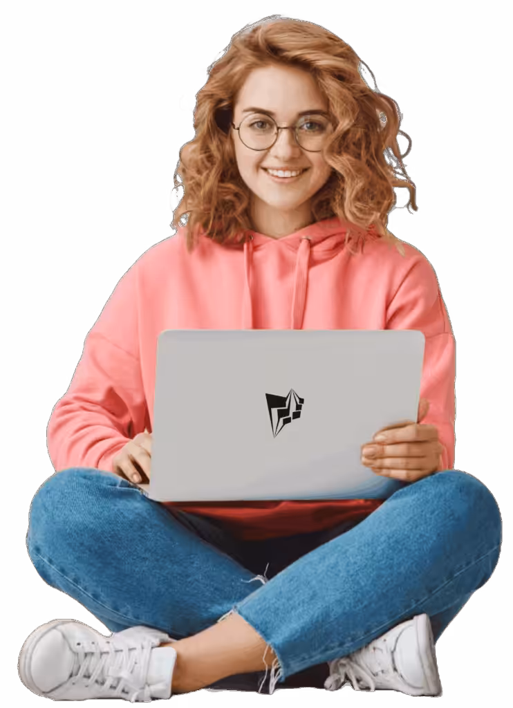 Person sitting cross-legged, holding a laptop, showcasing an SEO company Austin, TX.