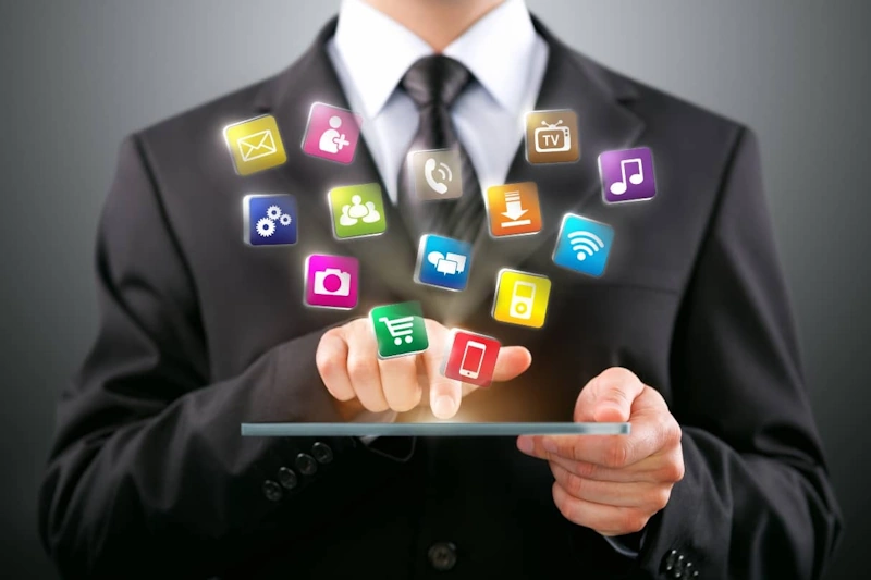 Individual managing online presence with social media management services on a tablet