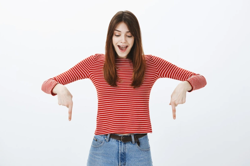 Excited woman pointing down toward a Telegram channel link for content creators