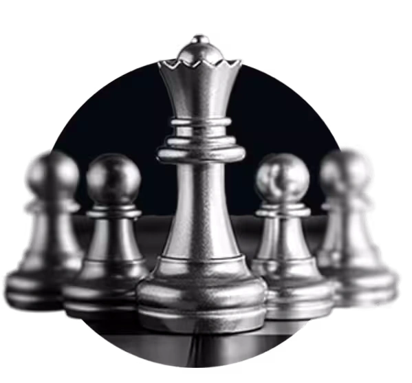A silver chess queen standing prominently in front of pawns, symbolizing a strategic campaign designed by a top Atlanta SEO Company.